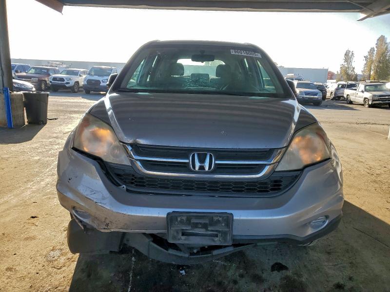 Photo 5 from auction – 2011 HONDA CR-V LX with VIN 5J6RE3H35BL026503