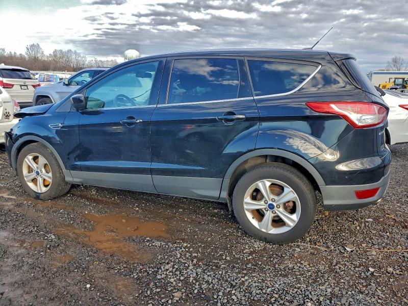 Photo 2 from auction – 2016 FORD ESCAPE SE with VIN 1FMCU9GX2GUB31583