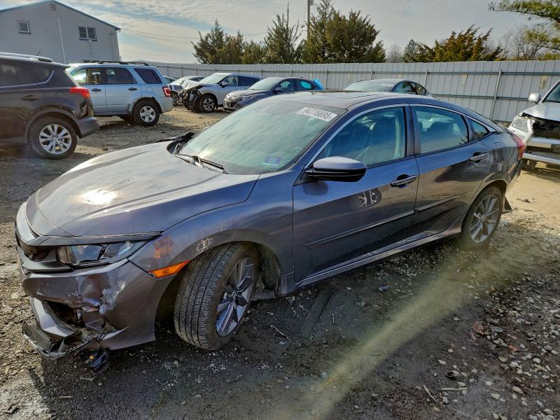 HONDA CIVIC EXL 2019 with VIN 2HGFC1F72KH651268 - Photo from auction