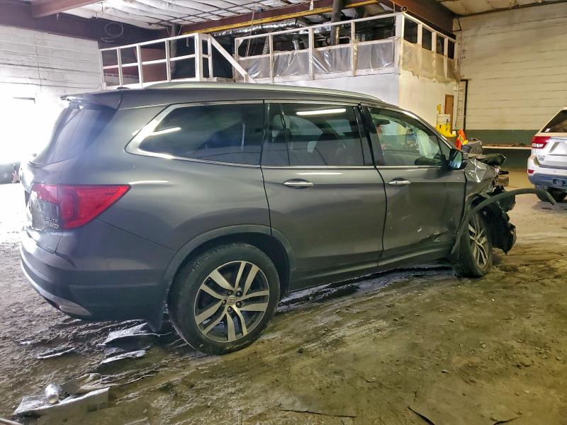 Photo 3 from auction – 2017 HONDA PILOT ELIT with VIN 5FNYF6H02HB103703