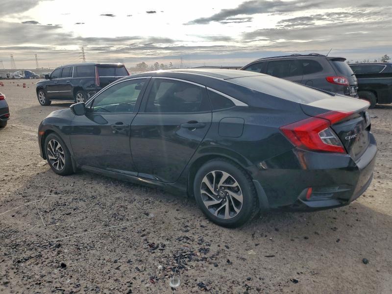 Photo 2 from auction – 2016 HONDA CIVIC EX with VIN 2HGFC2F72GH505420