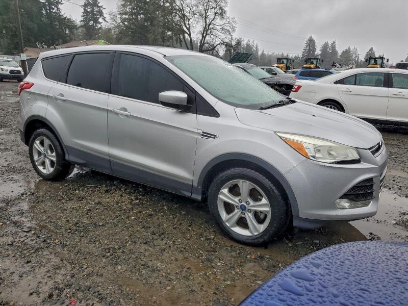 Photo 4 from auction – 2014 FORD ESCAPE SE with VIN 1FMCU9G95EUC93304