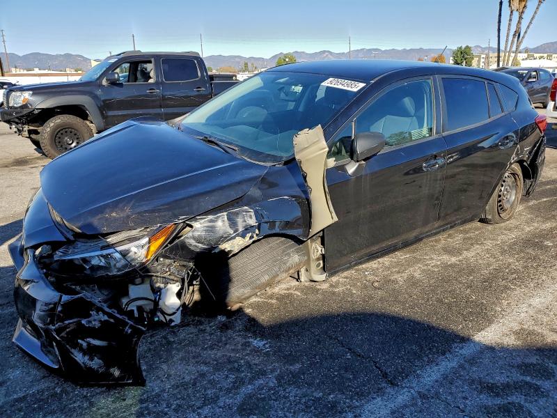 SUBARU IMPREZA 2019 with VIN 4S3GTAA64K3746824 - Photo from auction
