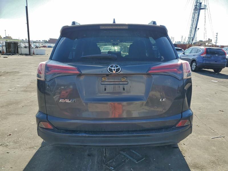 Photo 6 from auction – 2017 TOYOTA RAV4 LE with VIN JTMZFREV7HJ704331