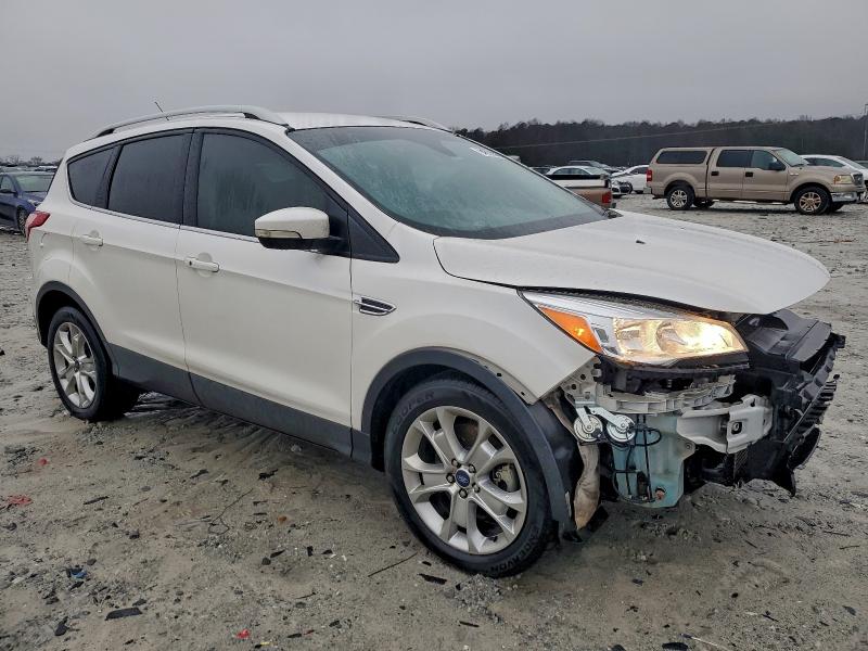 Photo 4 from auction – 2016 FORD ESCAPE TIT with VIN 1FMCU0J91GUB43486