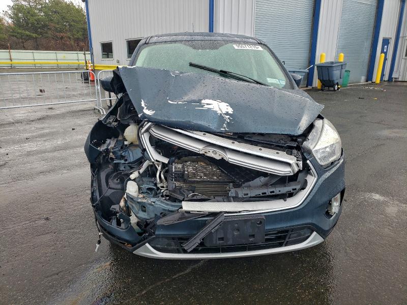 Photo 5 from auction – 2019 FORD ESCAPE with VIN 1FMCU9GD8KUA37612
