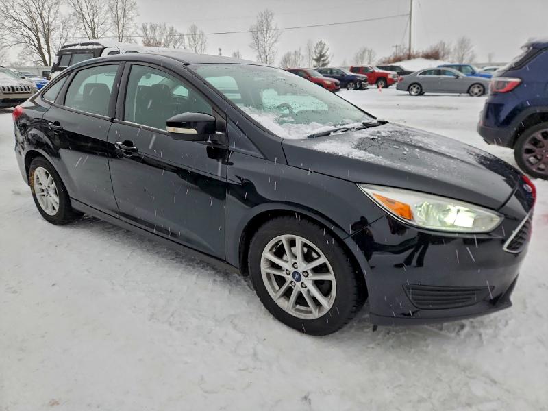 Photo 4 from auction – 2016 FORD FOCUS SE with VIN 1FADP3F22GL312374