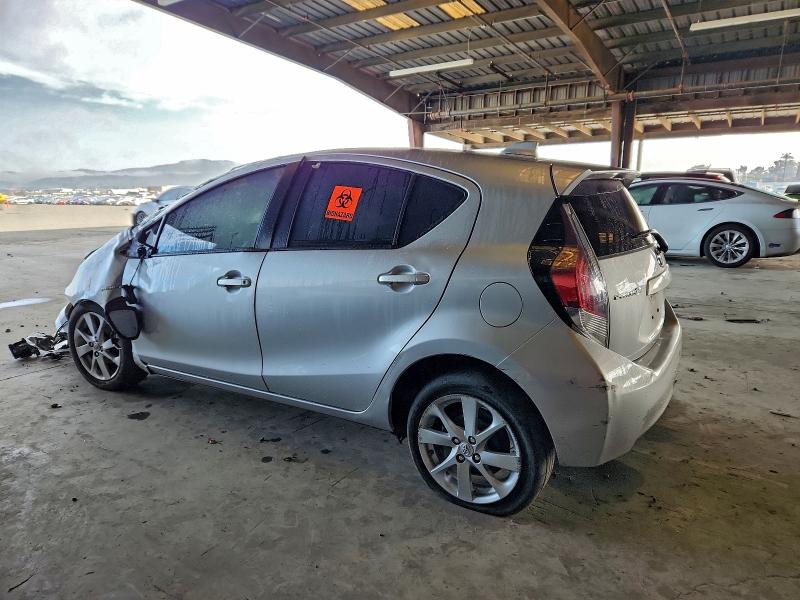 Photo 2 from auction – 2015 TOYOTA PRIUS C with VIN JTDKDTB39F1112546