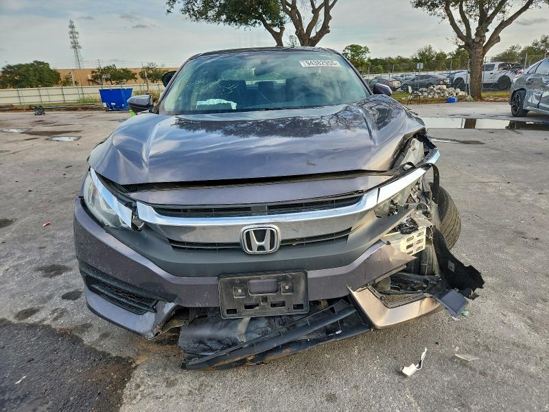 Photo 5 from auction – 2018 HONDA CIVIC with VIN 19XFC2F55JE030247