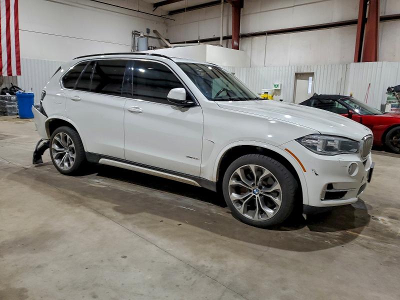 Photo 4 from auction – 2014 BMW X5 XDRIVE5 with VIN 5UXKR6C56E0J71849