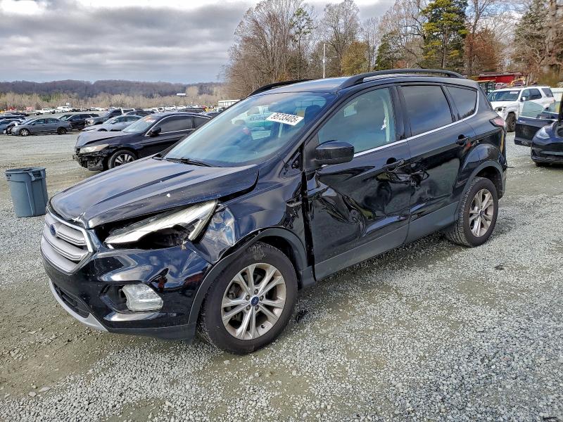 FORD ESCAPE SE 2018 with VIN 1FMCU0GDXJUA88278 - Photo from auction