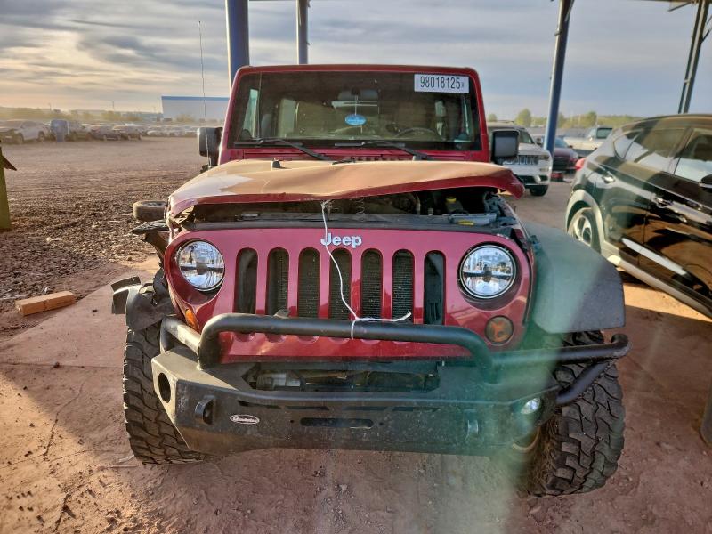 Photo 5 from auction – 2011 JEEP WRANGLER U with VIN 1J4BA6H11BL585964