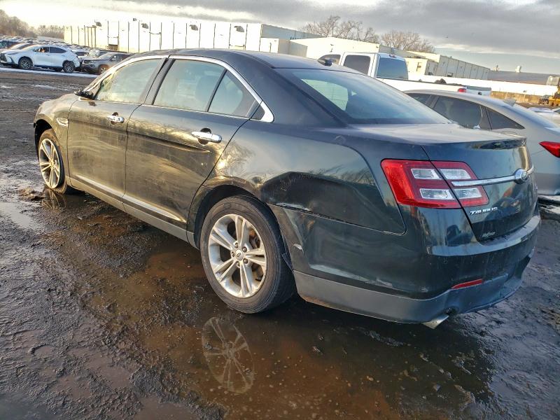 Photo 2 from auction – 2014 FORD TAURUS SEL with VIN 1FAHP2E80EG135914