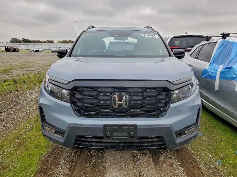 Foto 5 de la subasta – 2023 HONDA PASSPORT E con VIN 5FNYF8H09PB017119