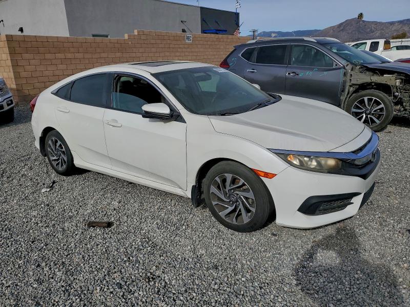 Photo 4 from auction – 2016 HONDA CIVIC EX with VIN 2HGFC2F71GH535234