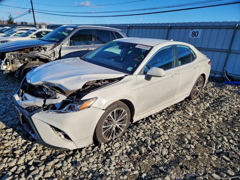 TOYOTA CAMRY 2020 with VIN 4T1G11AK2LU907035 - Photo from auction