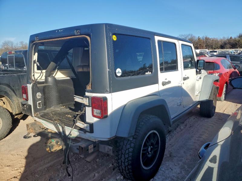 Photo 3 from auction – 2011 JEEP WRANGLER U with VIN 1J4HA6H18BL600616