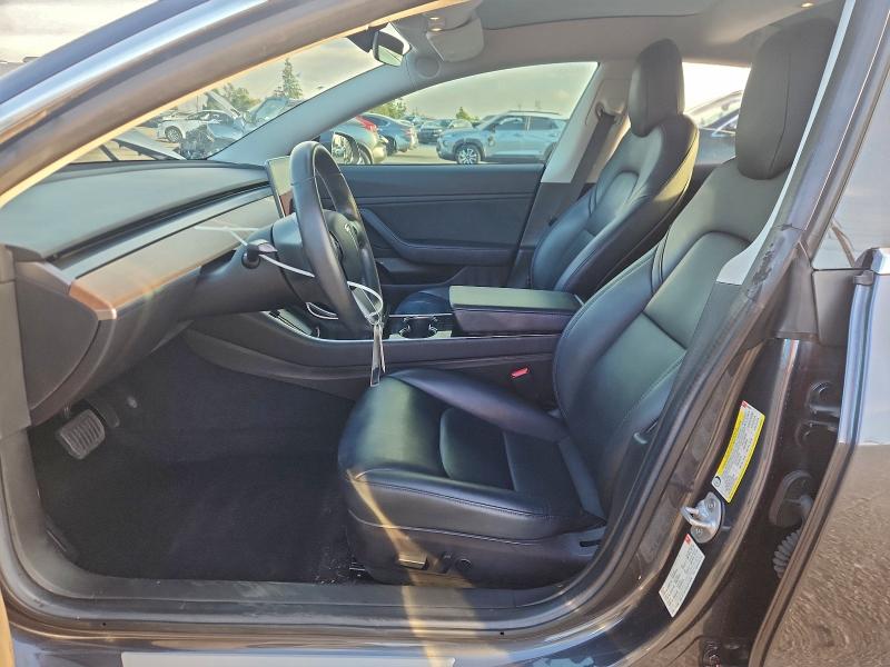 Photo 7 from auction – 2018 TESLA MODEL 3 with VIN 5YJ3E1EA9JF014049