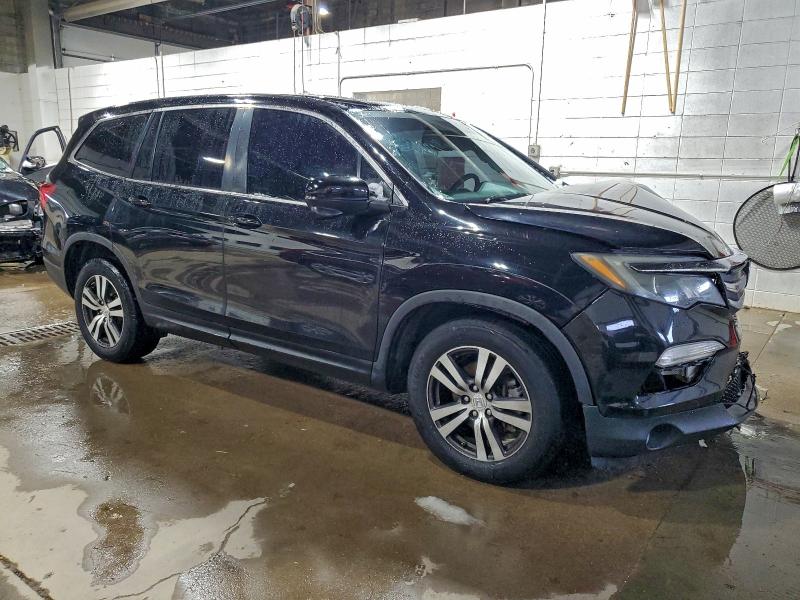 Photo 4 from auction – 2016 HONDA PILOT EXL with VIN 5FNYF6H58GB069499