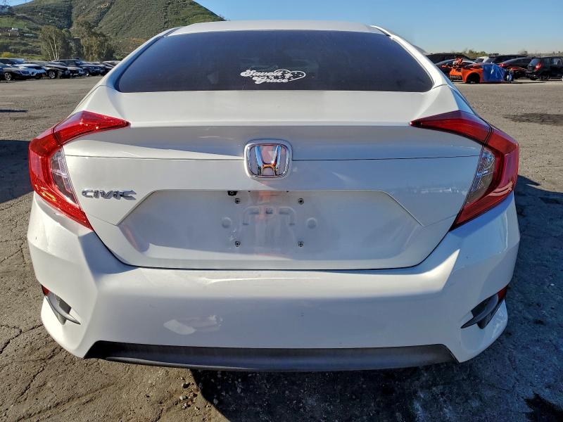 Photo 6 from auction – 2016 HONDA CIVIC LX with VIN 2HGFC2F58GH538078