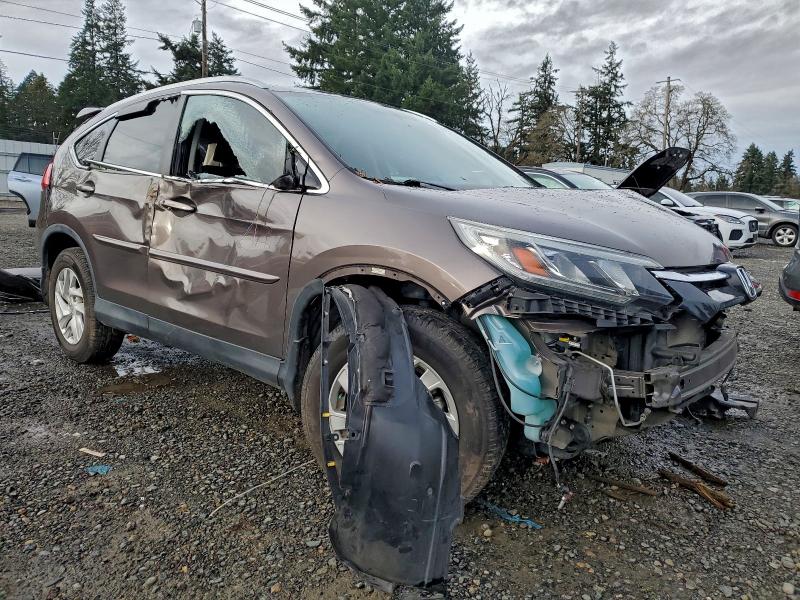 Photo 4 from auction – 2015 HONDA CR-V EXL with VIN 2HKRM4H75FH669395