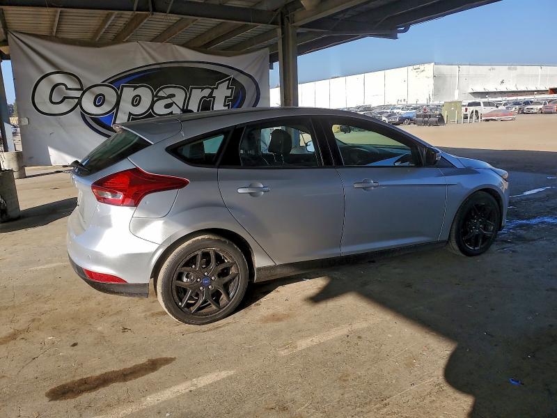 Photo 3 from auction – 2016 FORD FOCUS SE with VIN 1FADP3K27GL407101
