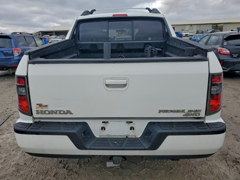 Photo 6 from auction – 2012 HONDA RIDGELINE with VIN 5FPYK1F53CB460546
