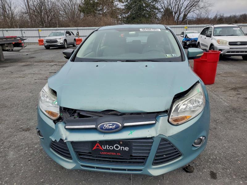 Photo 5 from auction – 2012 FORD FOCUS SE with VIN 1FAHP3K24CL254995
