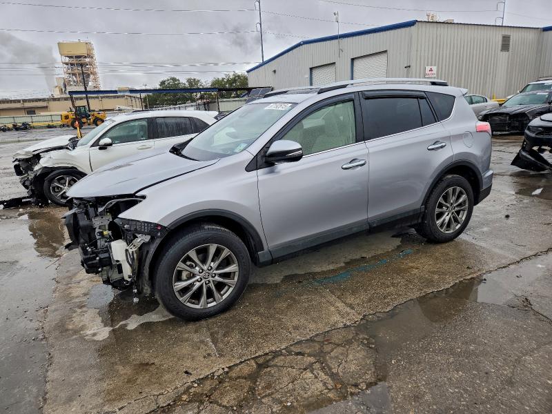 TOYOTA RAV4 LIMIT 2018 with VIN JTMYFREV1JD120877 - Photo from auction