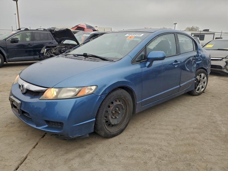 HONDA CIVIC LX 2011 with VIN 2HGFA1F50BH544448 - Photo from auction