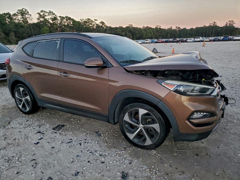 Photo 4 from auction – 2016 HYUNDAI TUCSON LIM with VIN KM8J33A22GU085144