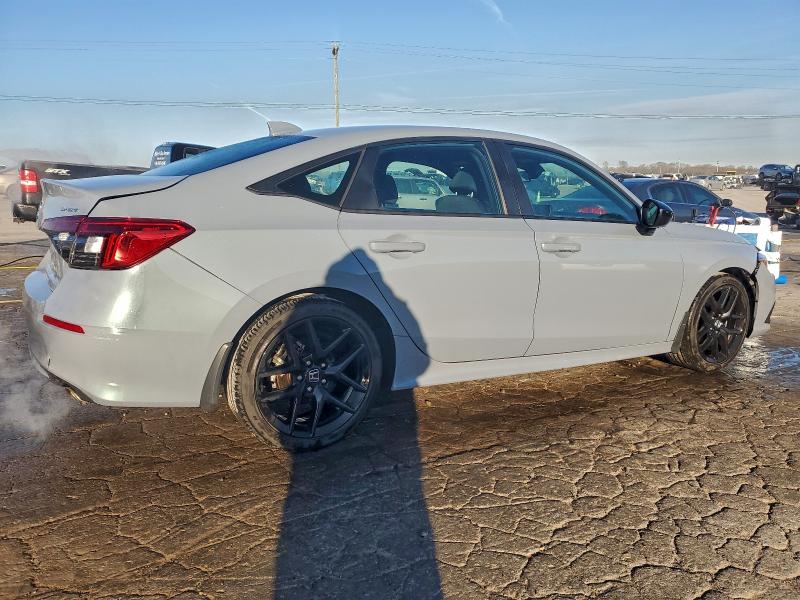 Photo 3 from auction – 2023 HONDA CIVIC SPOR with VIN 2HGFE2F52PH530035
