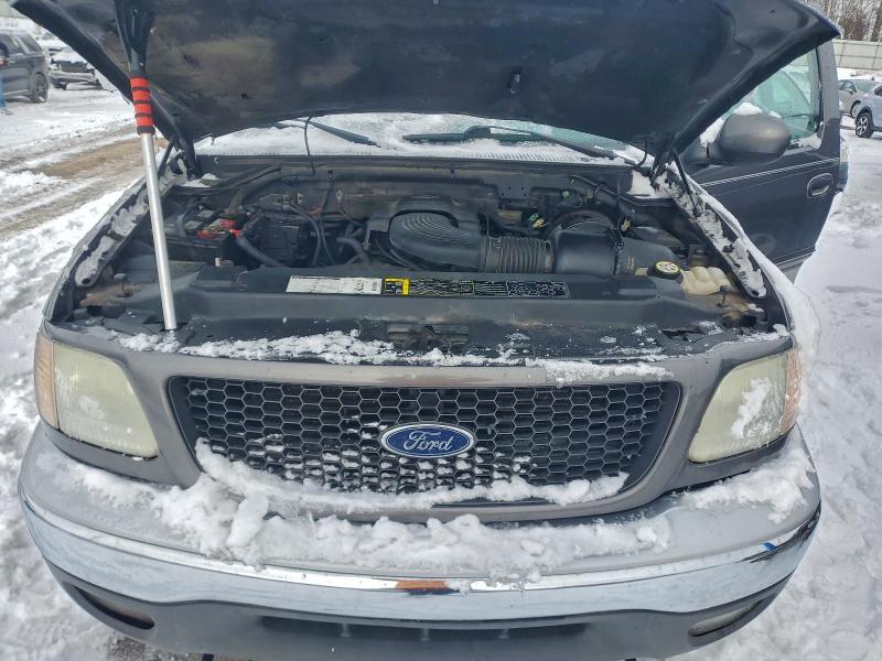Photo 11 from auction – 2002 FORD F150 with VIN 2FTRX18W72CA38533