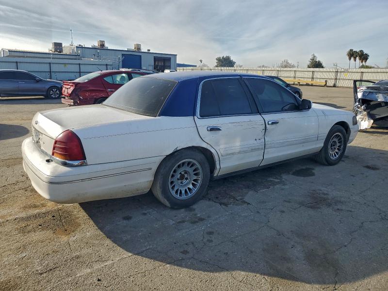 Photo 3 from auction – 2001 FORD CROWN VICT with VIN 2FAFP74W01X127823