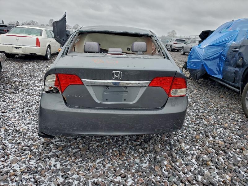 Photo 6 from auction – 2009 HONDA CIVIC LX with VIN 19XFA16579E036112