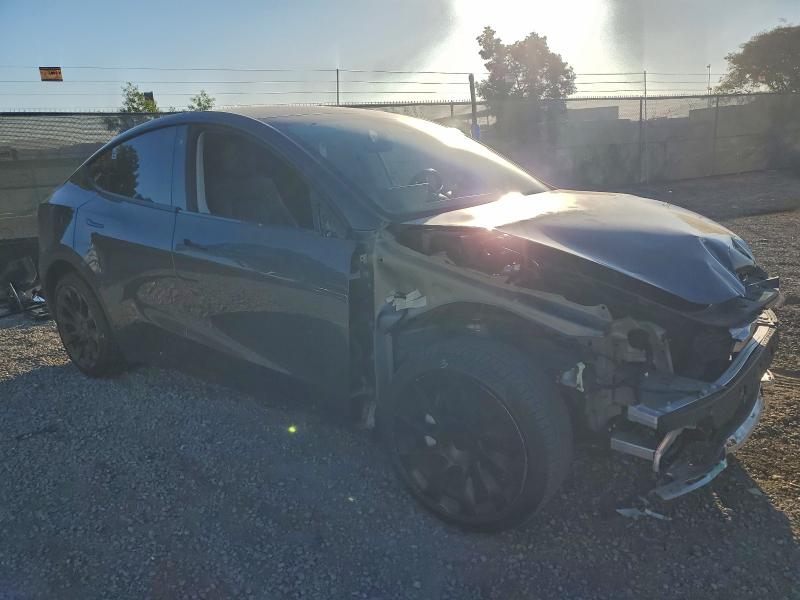 Photo 4 from auction – 2022 TESLA MODEL Y with VIN 7SAYGDEE9NF343301