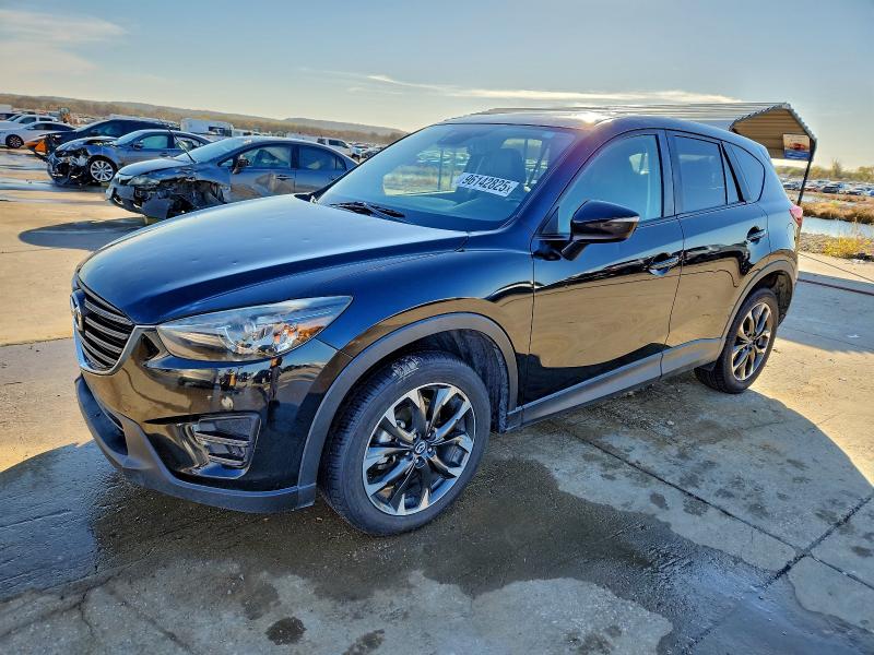 MAZDA CX-5 GT 2016 with VIN JM3KE2DY9G0850832 - Photo from auction