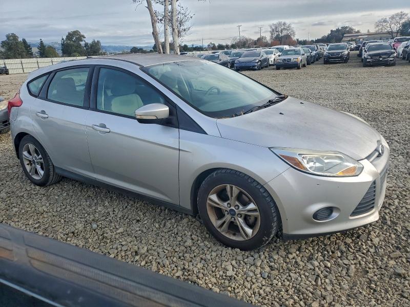 Photo 4 from auction – 2014 FORD FOCUS with VIN 1FADP3K25EL271600