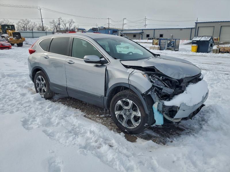 Photo 4 from auction – 2018 HONDA CR-V EX with VIN 2HKRW2H50JH699295