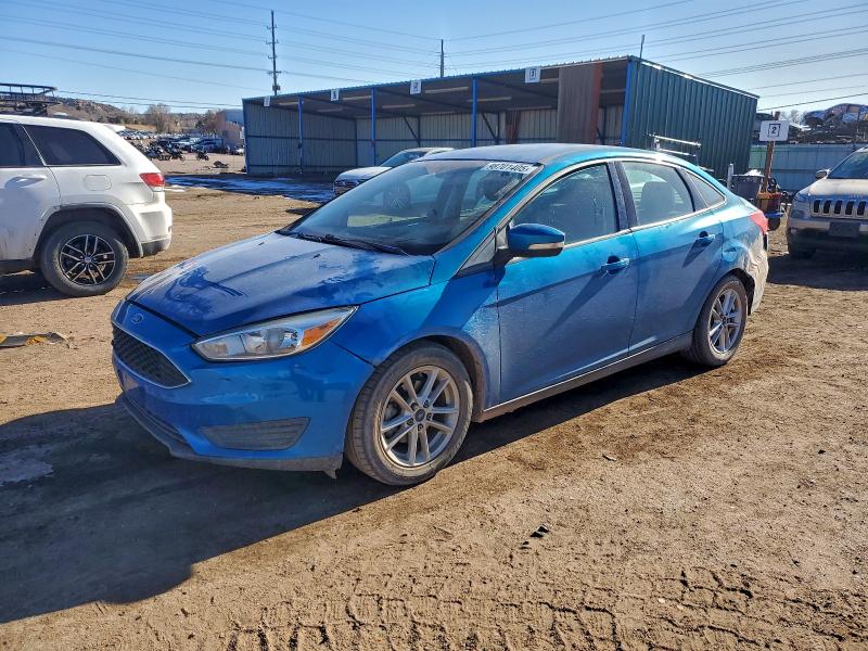 FORD FOCUS SE 2015 with VIN 1FADP3F23FL210760 - Photo from auction