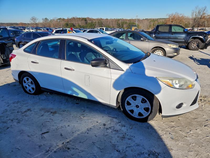 Photo 4 from auction – 2014 FORD FOCUS S with VIN 1FADP3E24EL112580