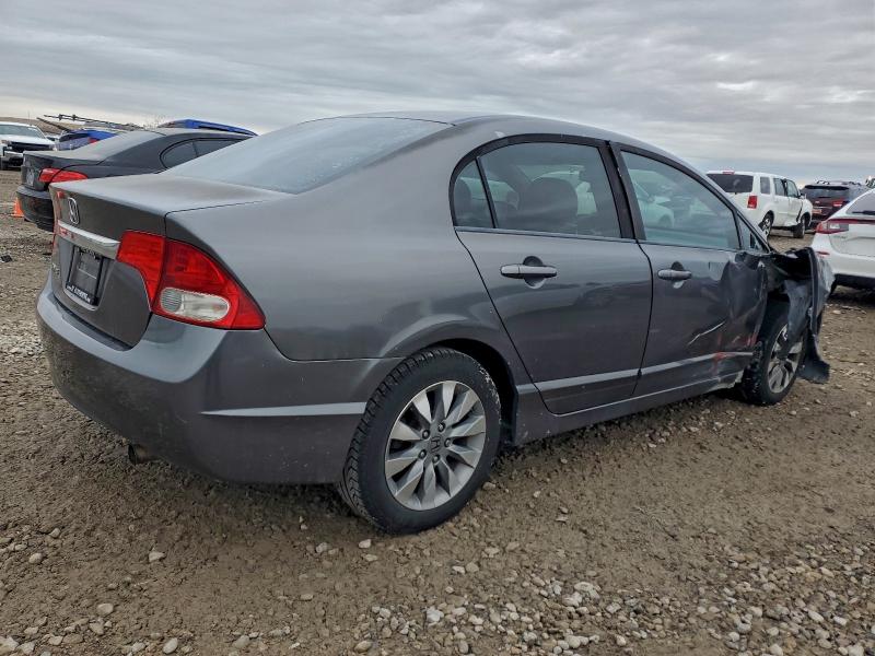 Photo 3 from auction – 2010 HONDA CIVIC EXL with VIN 19XFA1F90AE008465