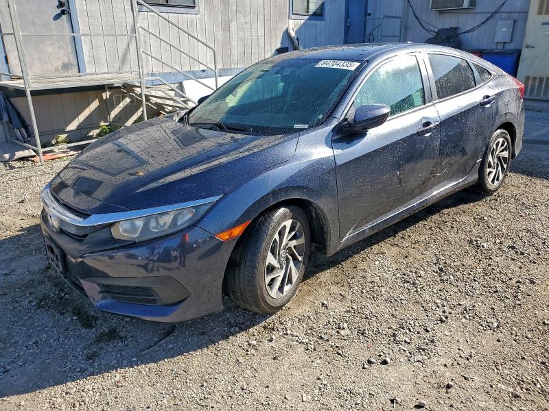 HONDA CIVIC EX 2017 with VIN 19XFC2F77HE213922 - Photo from auction