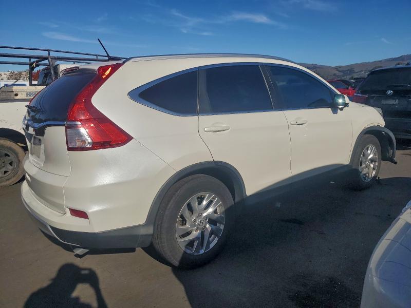Photo 3 from auction – 2015 HONDA CR-V EXL with VIN 5J6RM3H72FL002588