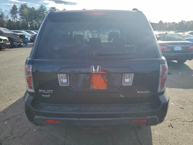 Photo 6 from auction – 2006 HONDA PILOT EX with VIN 2HKYF18566H554128
