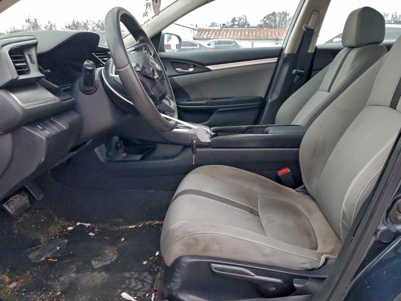 Photo 7 from auction – 2018 HONDA CIVIC LX with VIN 19XFC2F53JE007470