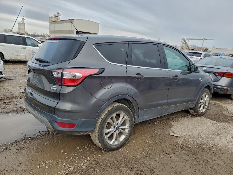 Photo 3 from auction – 2017 FORD ESCAPE SE with VIN 1FMCU0GD8HUD82014