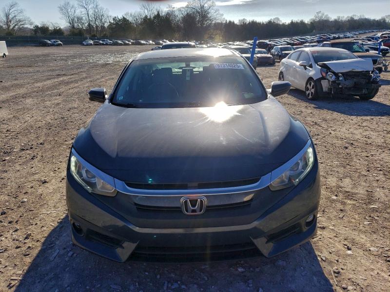 Photo 5 from auction – 2016 HONDA CIVIC EX with VIN 19XFC1F31GE012233