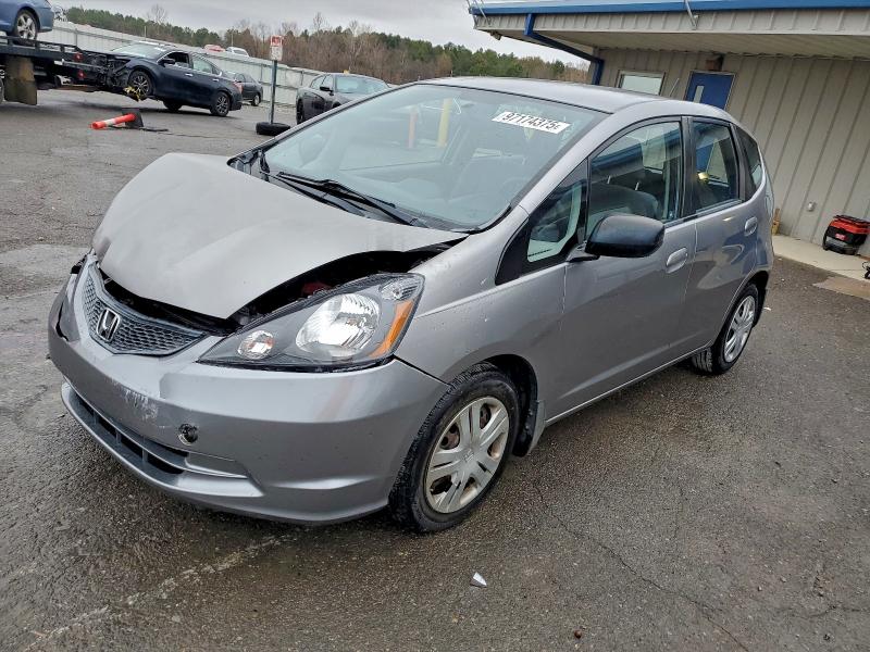 HONDA FIT 2009 with VIN JHMGE88249S007036 - Photo from auction