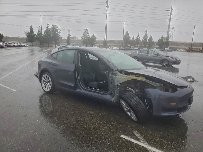 Photo 4 from auction – 2021 TESLA MODEL 3 with VIN 5YJ3E1EA8MF996323